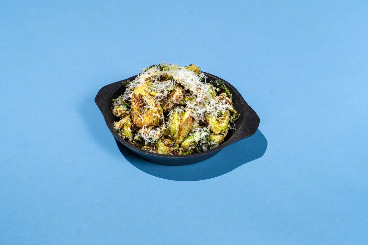 Caesar dressing, grated parmesan cheese